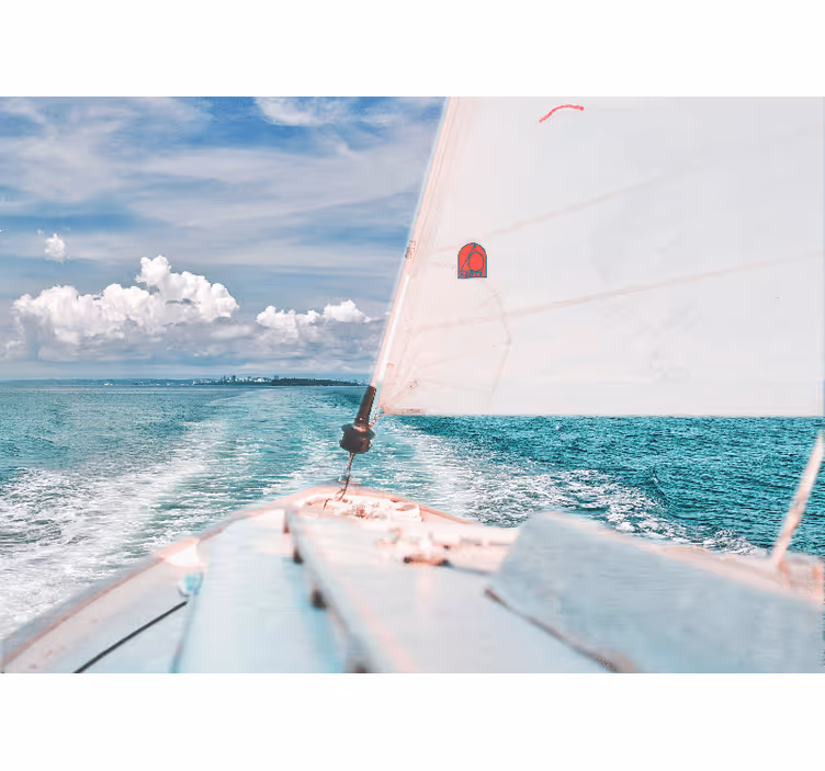 Blue wall mural boat in the sea with white clouds - TenStickers