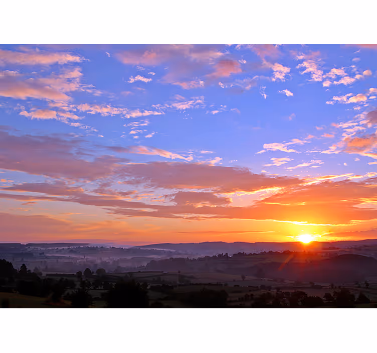 Sunset over hills landscape mural wallpaper - TenStickers