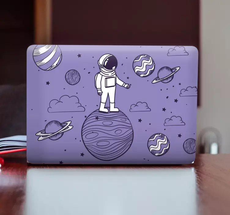 Astronaut on Planet laptop skin - TenStickers