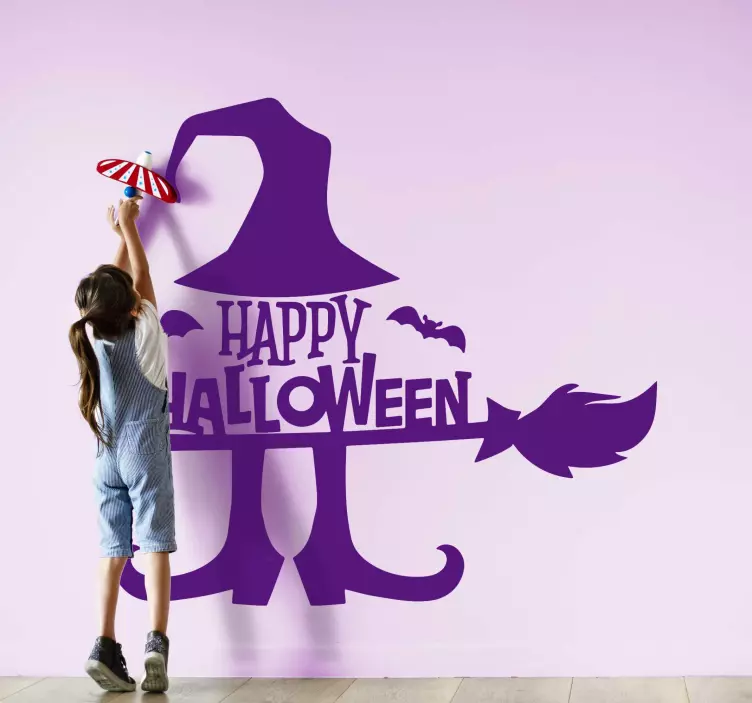 Witch flying on a broom Halloween sticker - TenStickers