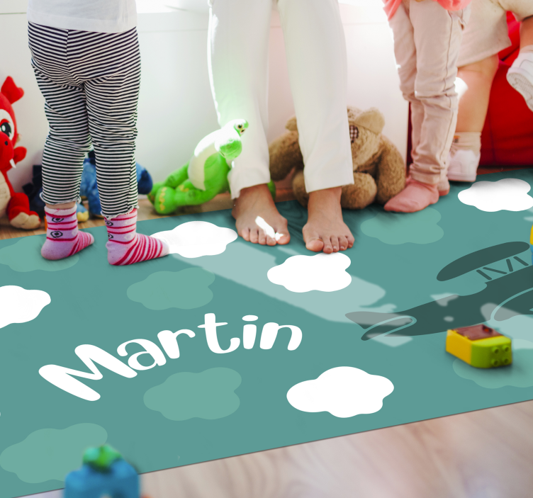 Clouds and airplane with name vinyl rug - TenStickers