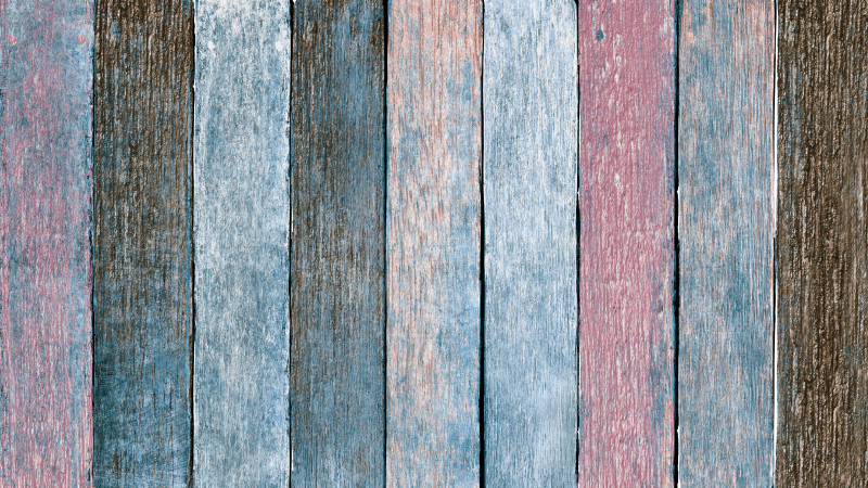 Bedroom vinyl rug in rustic colorful wood planks - TenStickers